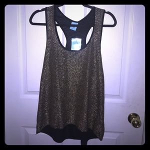 Gold racer back tank. NWT. Medium